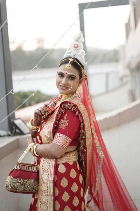 Priya Chatterjee in traditional Bengali bridal look